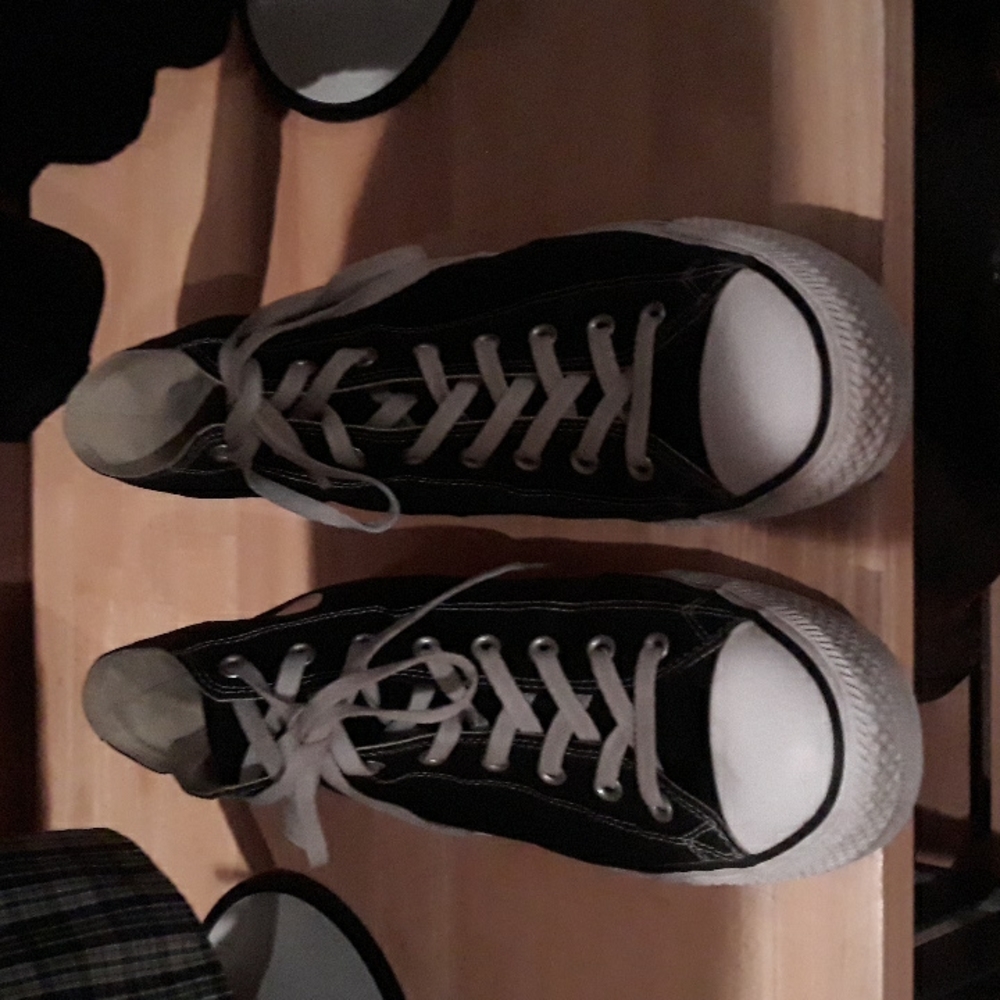Converse, high top, black and still many miles on them as you can see. Size 13.
